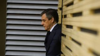 French "Les Republicains" party candidate for 2017 presidential election Francois Fillon arrives to take part in a meeting