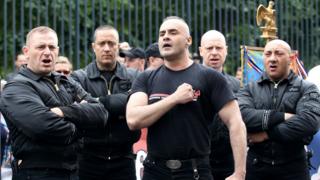 Far-right leader Serge Ayoub (C) with fellow activists in Paris in 2011