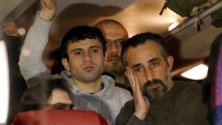 Refugees inside a bus which travelled from the Bavarian town of Landshut to the Chancellery building in Berlin, Germany, January 14, 2016.