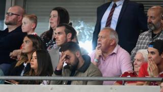 Gareth Bale watching match from stands