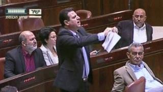 Arab MP Ayman Odeh ripped the 'muezzin bill' up in the Knesset (8 March 2017)