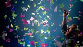 Chris Martin from Coldplay performs at Glastonbury
