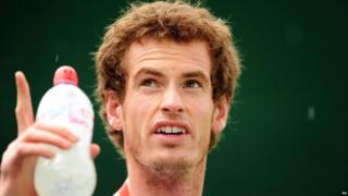 Andy Murray looks at the rain