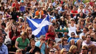 Murray fans hold up a Scottish flag on Murray Mount