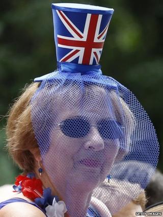 Woman wearing a hat with a Union Jack on it