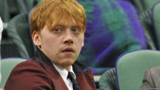 Rupert Grint watching tennis at Wimbledon in June 2011