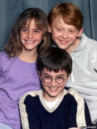 Actors Emma Watson, Rupert Grint and Daniel Radcliffe attend a photocall to present the new cast of the Harry Potter Films on August 23, 2000 in London