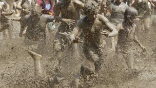 Thousands of people attend annual Mud Festival in America