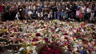 Flowers and candles outside Oslo Cathedral, Sunday, 24 July, 2011