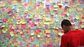 Hundreds of notes have been posted on a "peace wall" on the boarded-up window of a store in Peckham, south London