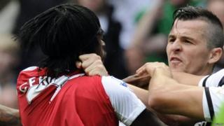 Joey Barton and Gervinho argue on the pitch