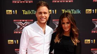 Olly Murs and TV presenter Caroline Flack attend the launch of the 2011 X Factor.