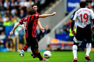 David Silva hitting a shot