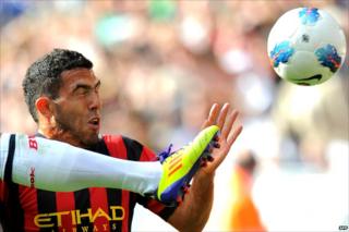 Tevez challenging for the ball