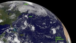 This NASA satellite image shows Irene over eastern Canada, Jose in the central Atlantic and Tropical Depression 12 in the far eastern Atlantic.
