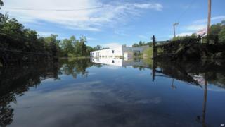 Rain caused flooding here in New Jersey. Rivers in northern Jersey are still rising and people are being evacuated along the low lying areas of the river. Tropical Storm Irene left over 600,000 homes and businesses without power in New Jersey.