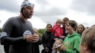 David Walliams greets fans offering support on his Sport Relief swim of the River Thames.
