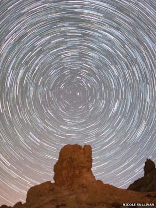 Star trails above the Nevada mountains.