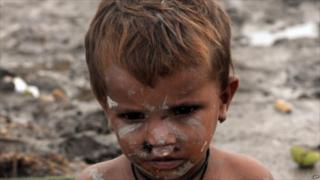 A child in a flood-affected evacuation camp at Golarchi town