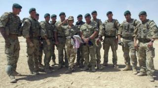 Cheryl Cole saluting troops