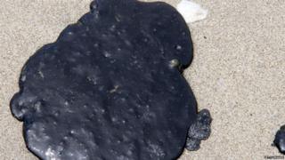 Lump of oil on the beach