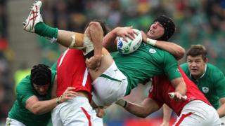 Stephen Ferris tackled by Sam Warburton