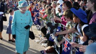 Queen greeting crowds