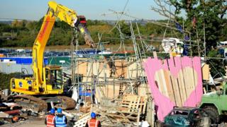 Crane destroys scaffolding at Dale Farm