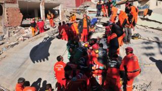 Rescue workers looking for survivors