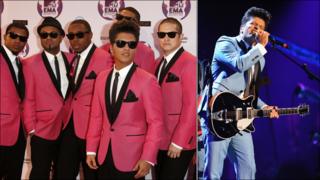 Bruno Mars with band members