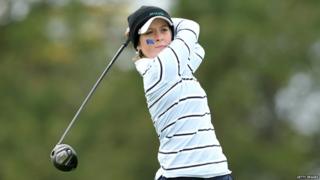 Lauren Taylor playing golf
