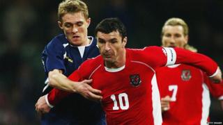 Gary Speed playing for Wales against Scotland