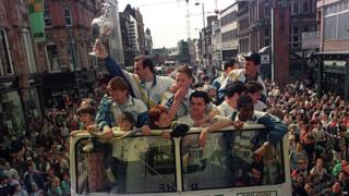 Gary Speed (centre) celebrates Leeds United winning the Championship trophy