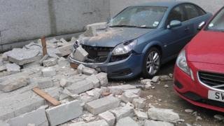 Cars damaged by falling wall in Aberdeen, Scotland