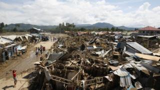 Collapsed houses in Iligan, southern Philippines