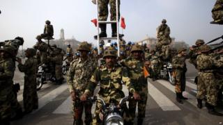 Soldiers parading through the streets