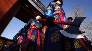 Performers in traditional costumes at Chinese New Year celebrations in Beijing, China