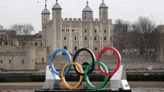 The Olympic rings in front of the Tower of London.
