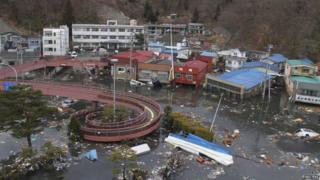 Streets flooded after the tsunami had struck - an area in Miyako, northeastern Japan in 2011