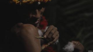 Awa man prepares for karawara ritual