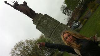Hayley next to a Statue of Liberty