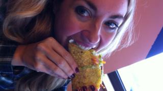 Hayley eating a yummy taco