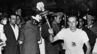 The Olympic flame arrives in Rome for the opening ceremony of the Rome Olympics, 25th August 1960.