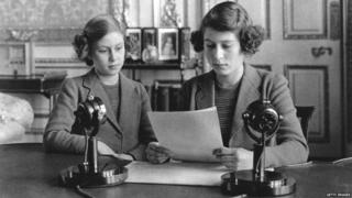 Princesses Elizabeth (right) and Margaret (1930 - 2002) making a broadcast to the children of the Empire during World War II.