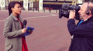 Leah reporting outside of Buckingham Palace