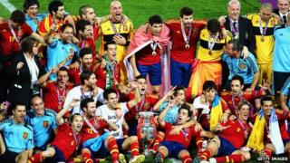 Spain team celebrate on pitch