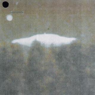 Photo of UFO above trees