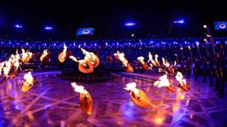 Olympic cauldron being lit.