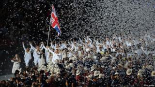 Sir Chris Hoy carried the Team GB flag.