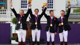 Nick Skelton, Ben Maher, Scott Brash and Peter Charles receiving their gold medals